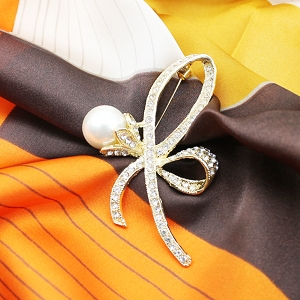  BROCHE NOEUD MULTIPERLE<br>Or